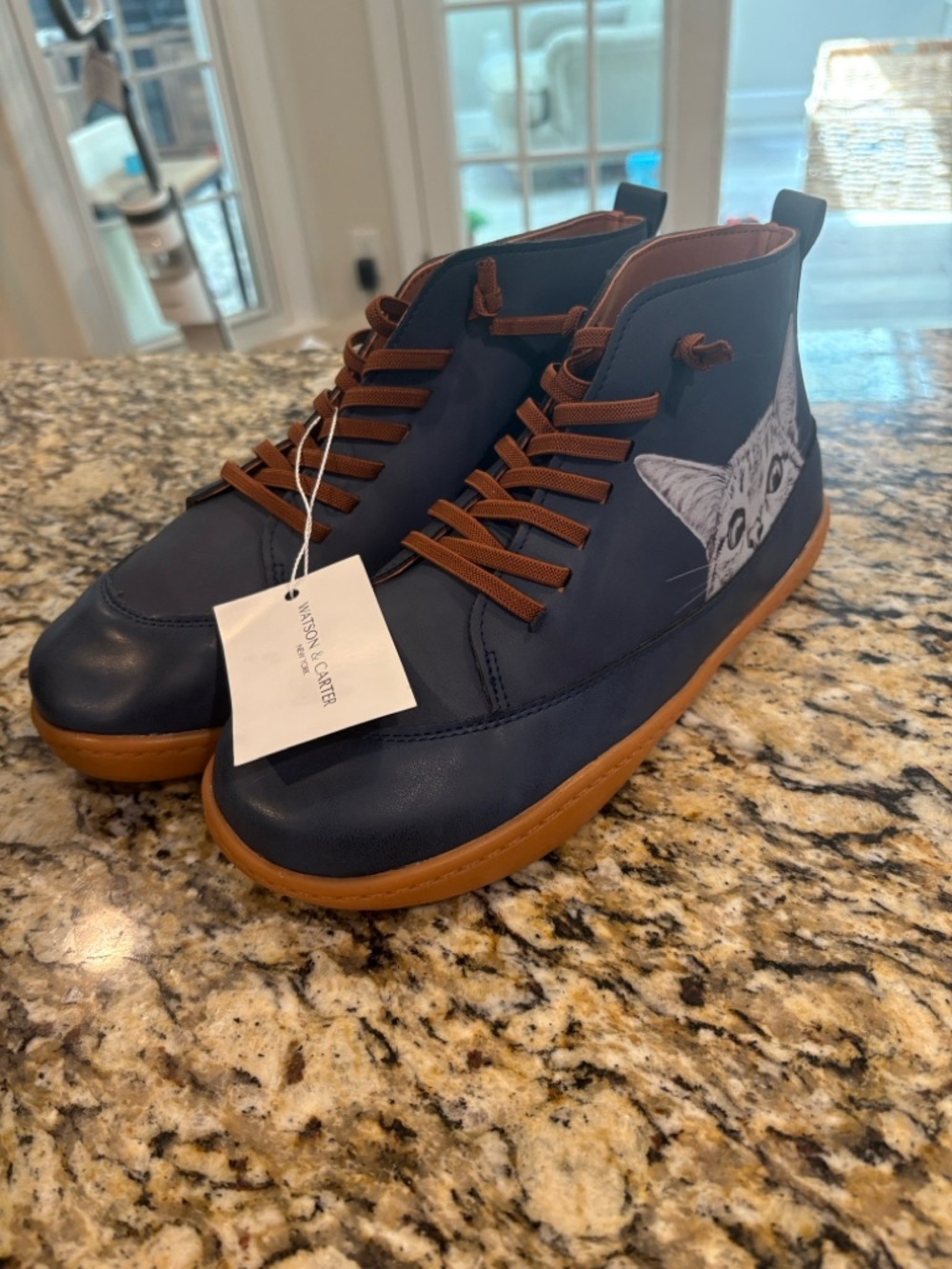 Women's Navy Cat Ankle Booties with Brown Accents